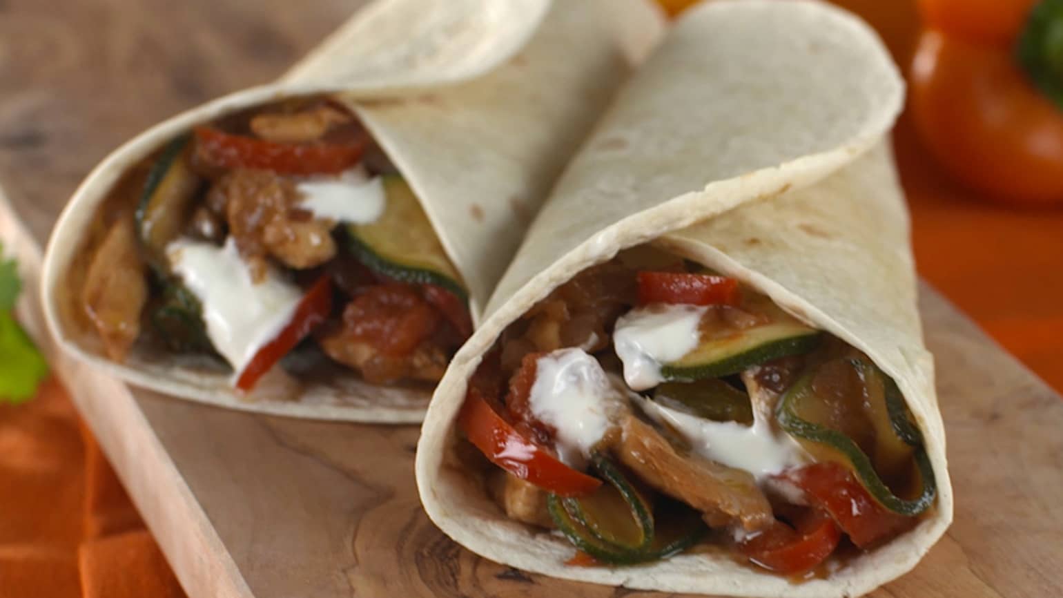 Old El Paso fajitas filled with chicken, courgette and sour cream
